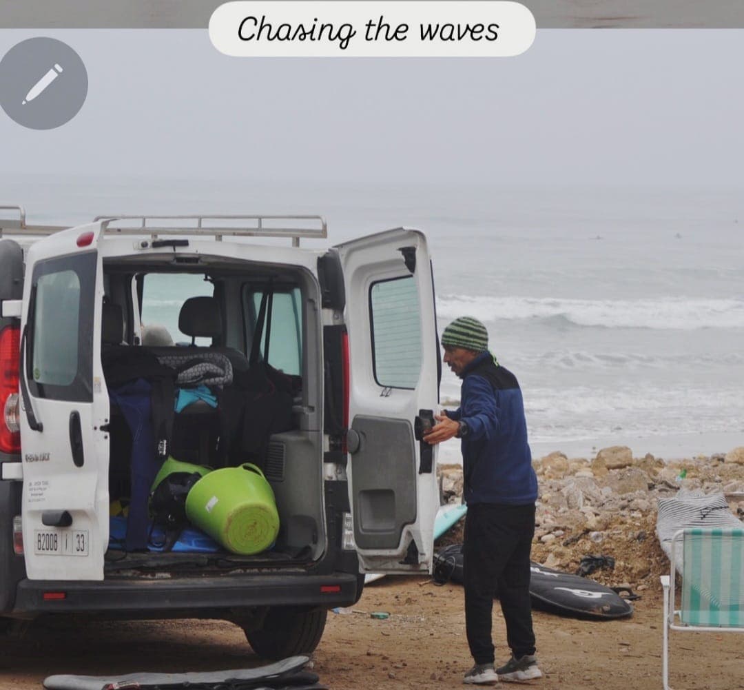 Surfboards being loaded beside the Atlantic coast