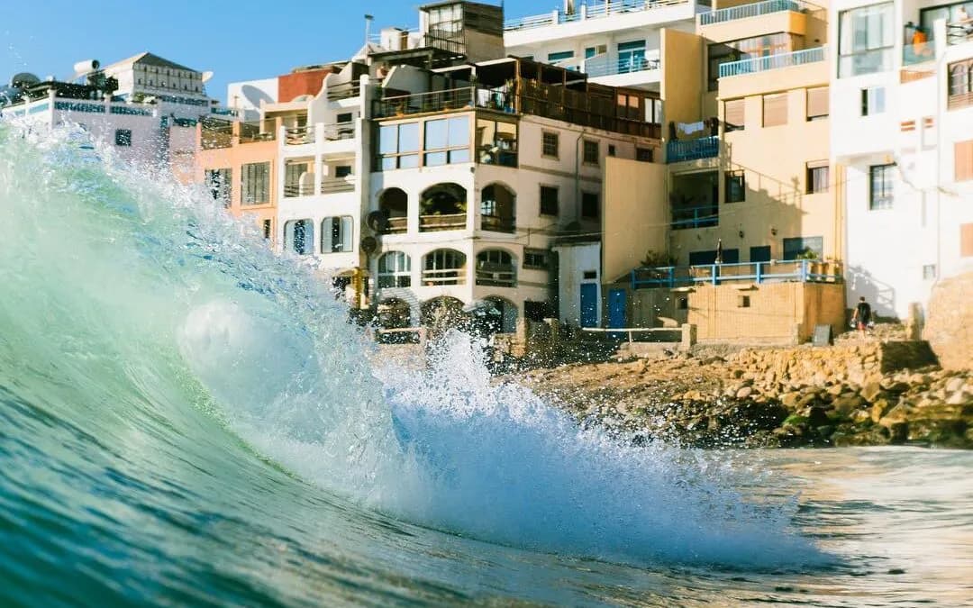 Wave breaking in front of Taghazout village at Hash Point