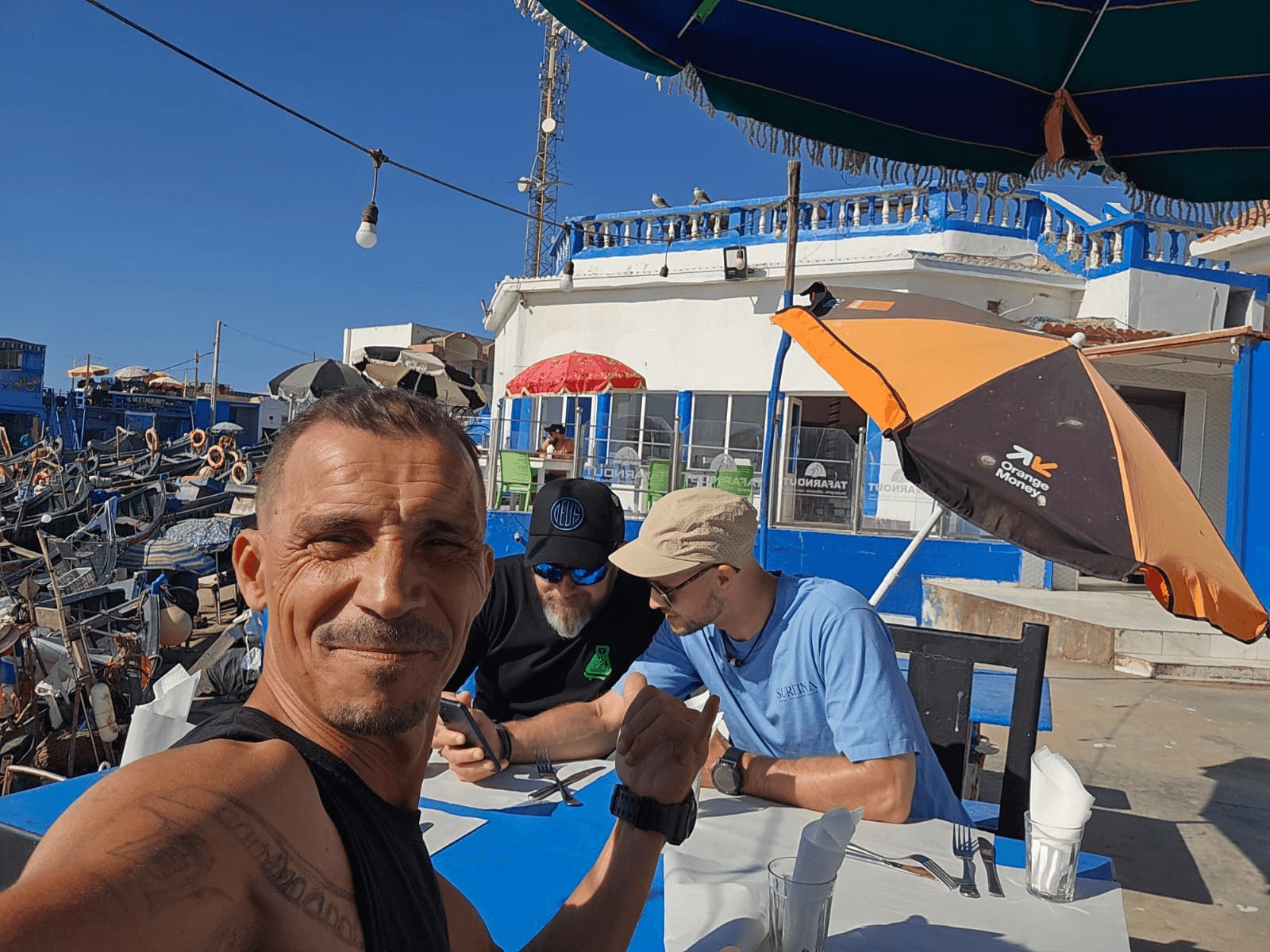 Ben Achir Yassni with guests at a Moroccan Atlantic harbour