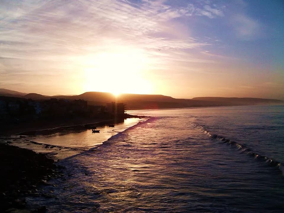 Sunset over Panorama Beach and Taghazout coastline